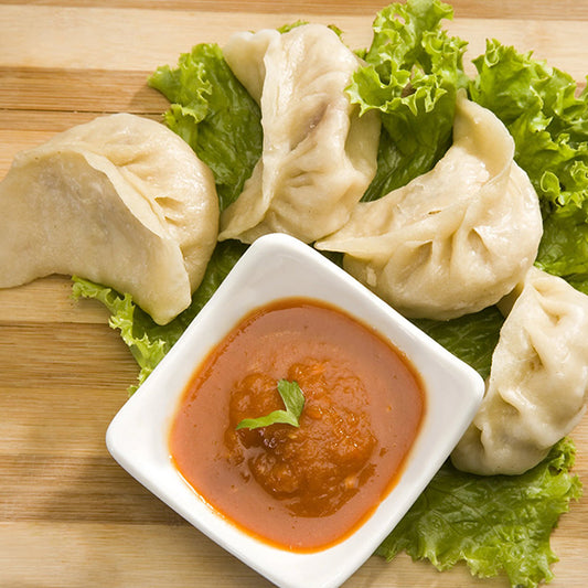Chilli Momos (Veg/Chicken)